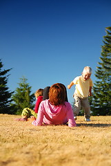 Image showing mother and kids having fun outside