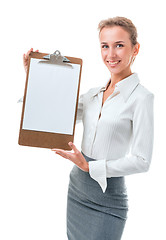 Image showing woman shows a blank clipboard