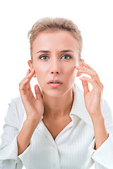 Image showing Portrait of a woman, peering hard into the mirrorPortrait of a w