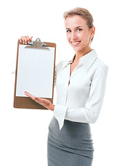 Image showing woman shows a blank clipboard