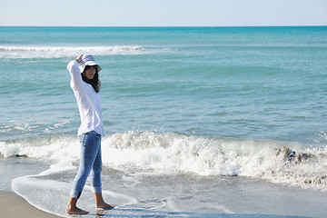 Image showing happy young woman on beach