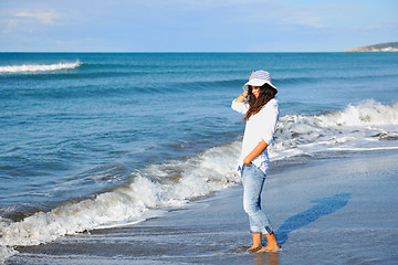 Image showing happy young woman on beach