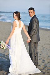 Image showing romantic beach wedding at sunset