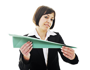 Image showing business woman throwing  paper airplane 