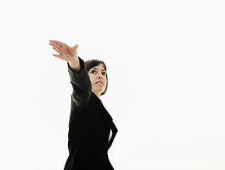 Image showing business woman throwing  paper airplane