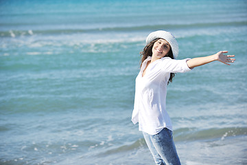 Image showing happy young woman on beach