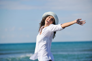 Image showing happy young woman on beach