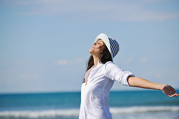 Image showing happy young woman on beach