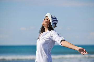 Image showing happy young woman on beach