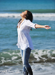 Image showing happy young woman on beach