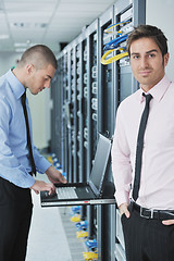 Image showing it engineers in network server room