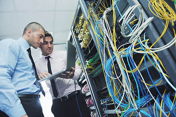 Image showing it engineers in network server room