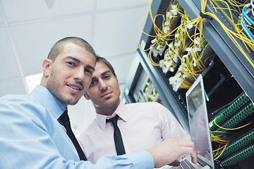 Image showing it engineers in network server room