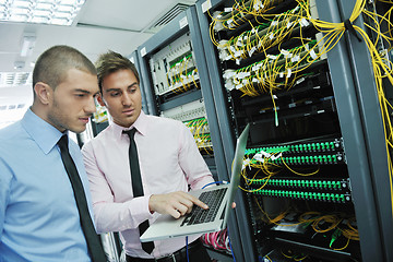 Image showing it engineers in network server room