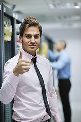 Image showing it engineers in network server room