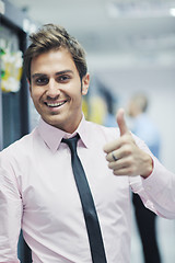 Image showing it engineers in network server room