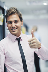 Image showing it engineers in network server room