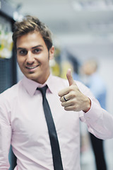 Image showing it engineers in network server room