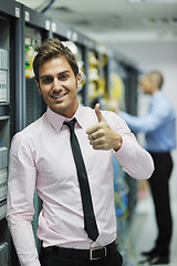 Image showing it engineers in network server room