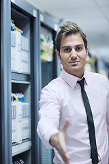 Image showing young it engineer in datacenter server room