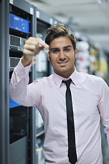 Image showing young it engineer in datacenter server room