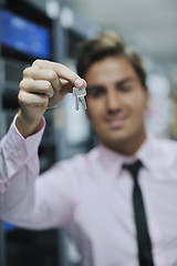 Image showing young it engineer in datacenter server room