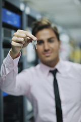 Image showing young it engineer in datacenter server room