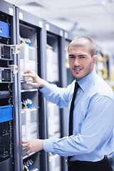 Image showing young it engineer in datacenter server room