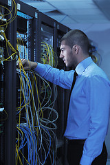 Image showing young it engineer in datacenter server room