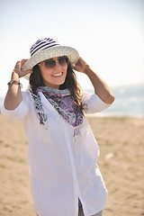 Image showing happy young woman on beach