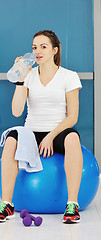 Image showing woman drink water at fitness workout