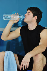 Image showing man drink water at fitness workout