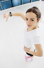 Image showing happy diet concept with young woman on pink scale