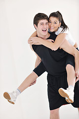 Image showing happy young couple fitness workout and fun