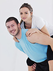 Image showing happy young couple fitness workout and fun