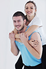 Image showing happy young couple fitness workout and fun