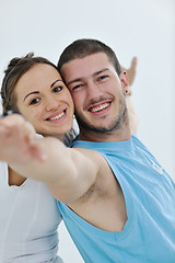 Image showing happy young couple fitness workout and fun