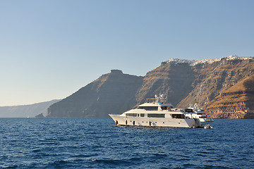 Image showing santorini island coast with luxury yacht