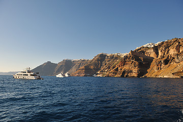 Image showing santorini island coast with luxury yacht