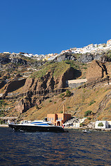 Image showing santorini island coast with luxury yacht