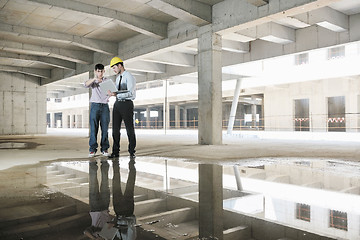 Image showing Team of architects on construciton site