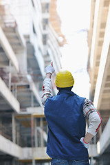 Image showing hard worker on construction site