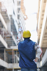 Image showing hard worker on construction site