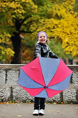 Image showing happy girl with umbrella