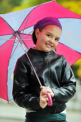 Image showing happy girl with umbrella