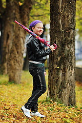 Image showing happy girl with umbrella