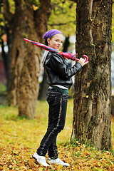 Image showing happy girl with umbrella