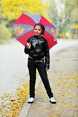 Image showing happy girl with umbrella