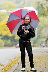 Image showing happy girl with umbrella