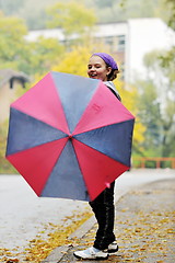 Image showing happy girl with umbrella